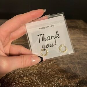Small gold hoops with pearl details new in packaging